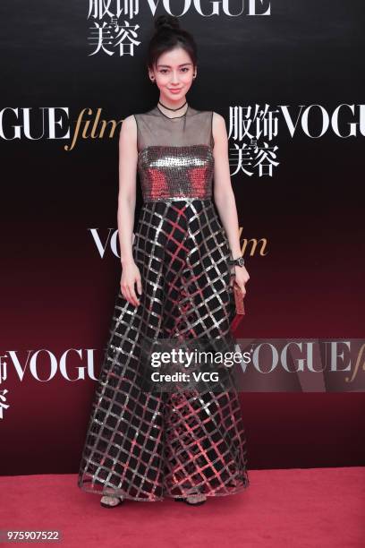 Actress Angelababy poses on the red carpet of 2018 Vogue Film Gala on June 15, 2018 in Shanghai, China.