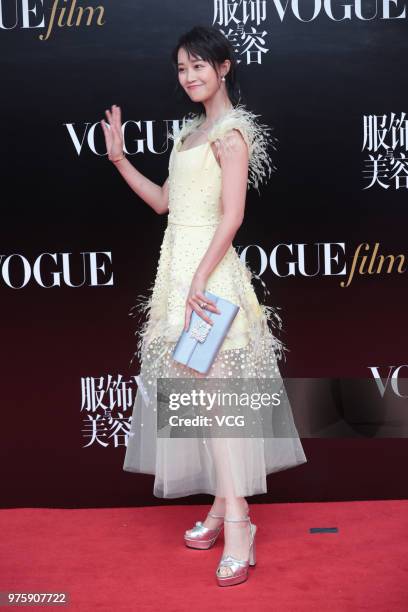 Actress Lan Yingying poses on the red carpet of 2018 Vogue Film Gala on June 15, 2018 in Shanghai, China.