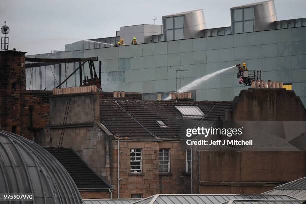 Fire fighters battle a blaze at the Mackintosh Building at the Glasgow School of Art for the second time in four years on June 16, 2018 in Glasgow,...