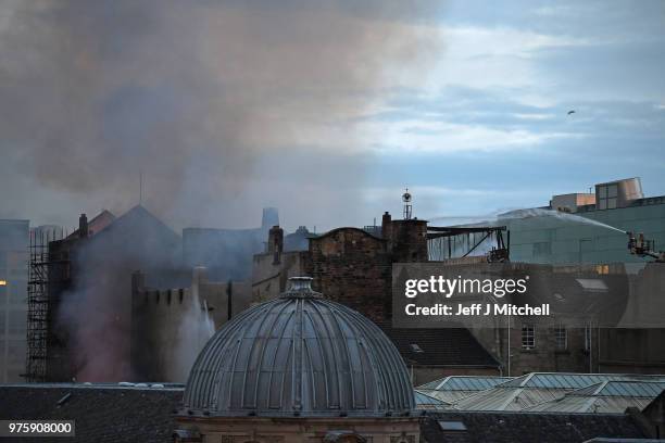 Fire fighters battle a blaze at the Mackintosh Building at the Glasgow School of Art for the second time in four years on June 16, 2018 in Glasgow,...