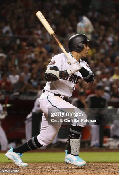 Jon Jay of the Arizona Diamondbacks hits a RBI single against the New York Mets during the sixth inning of the MLB game at Chase Field on June 15,...