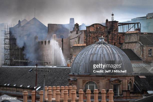 Fire fighters battle a blaze at the Mackintosh Building at the Glasgow School of Art for the second time in four years on June 16, 2018 in Glasgow,...