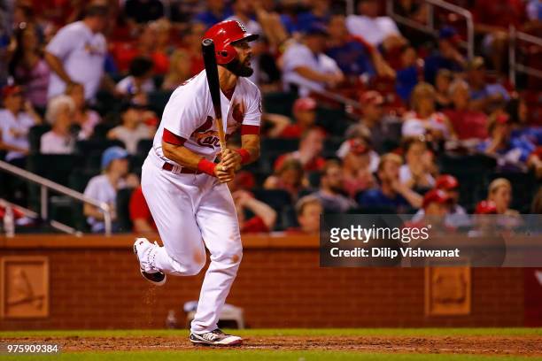 Matt Carpenter of the St. Louis Cardinals hits a two-run single against the Chicago Cubs in the seventh inning at Busch Stadium on June 15, 2018 in...
