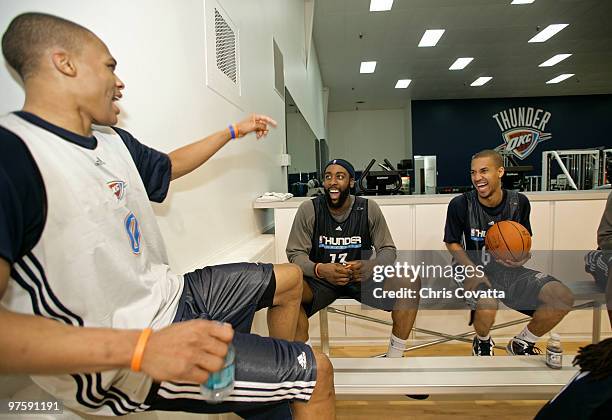 Russell Westbrook, James Harden, and Eric Maynor of the Oklahoma City Thunder take a break during practice on March 9, 2010 at the Integris Health...