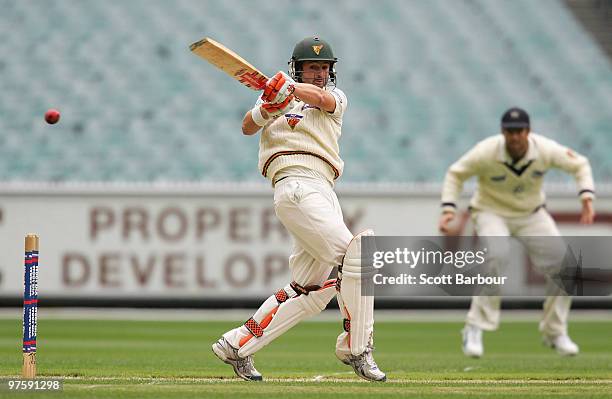 Ed Cowan of the Tigers plays a hook shot during day one of the Sheffield Shield match between the Victorian Bushrangers and the Tasmanian Tigers at...