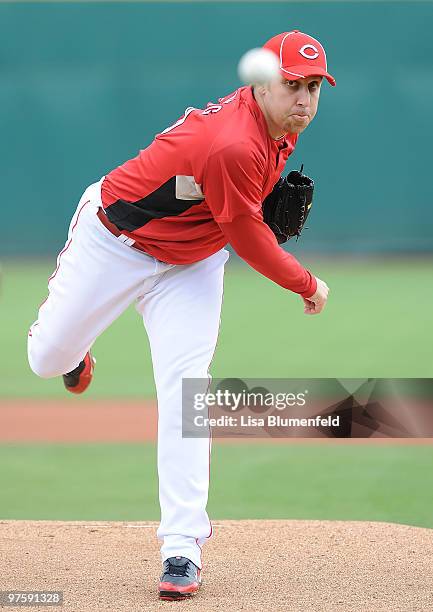 Aaron Harang of the Cincinnati Reds pitches during a Spring Training game against the Arizona Diamondbacks on March 9, 2010 at Goodyear Ballpark in...