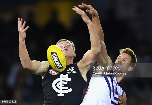 Patrick Kerr of the Blues and Joel Hamling of the Dockers compete for a markduring the round 13 AFL match between the Carlton Blues and the Fremantle...