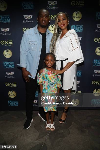 Tommicus Walker, Letoya Luckett, and Madison Walker attend TV One Private Dinner during American Black Film Festival 2018 at Mondrian South Beach on...