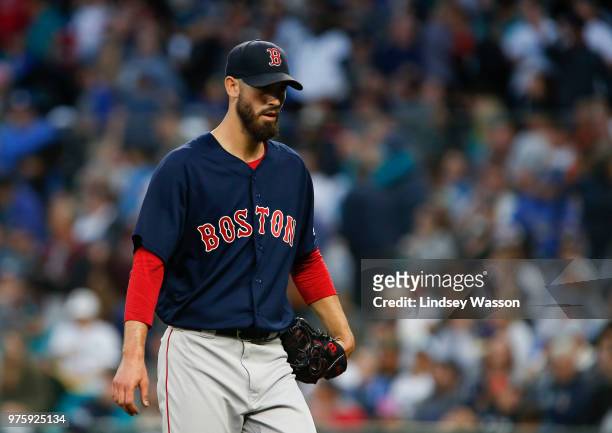Rick Porcello of the Boston Red Sox walks off the field after pitching in the fifth inning of the game against the Seattle Mariners at Safeco Field...