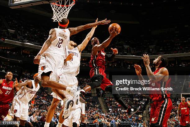 Tyrus Thomas of the Charlotte Bobcats blocks against the Miami Heat on March 9, 2010 at the Time Warner Cable Arena in Charlotte, North Carolina....