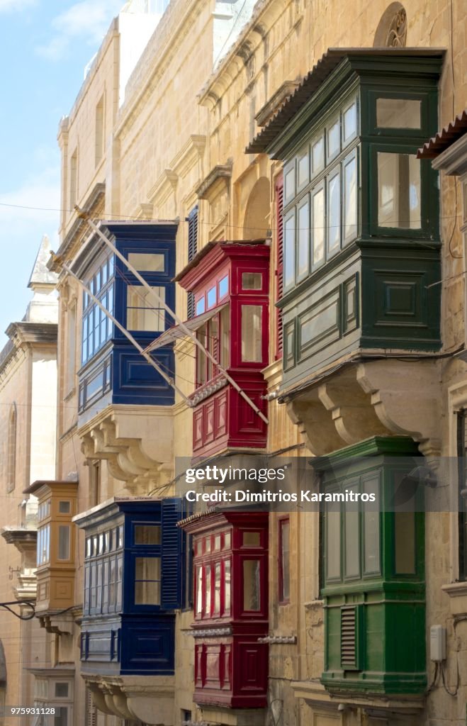 Colorful balconies on historic building, Valletta, Malta