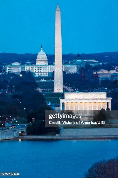 aerial of washington d.c. shows lincoln & washington memorial and u.s. capitol and memorial bridge - washington dc aerial stock-fotos und bilder