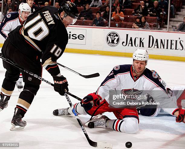 Jan Hejda of the Columbus Blue Jackets stops a shot on goal from Corey Perry of the Anaheim Ducks during the game on March 9, 2010 at Honda Center in...