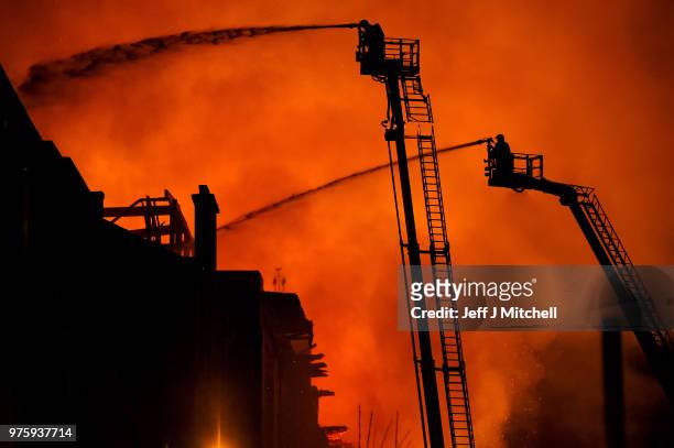Fire fighters battle a blaze at the Mackintosh Building at the Glasgow School of Art for the second time in four years on June 16, 2018 in Glasgow,...