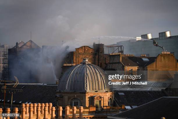 Fire fighters battle a blaze at the Mackintosh Building at the Glasgow School of Art for the second time in four years on June 16, 2018 in Glasgow,...