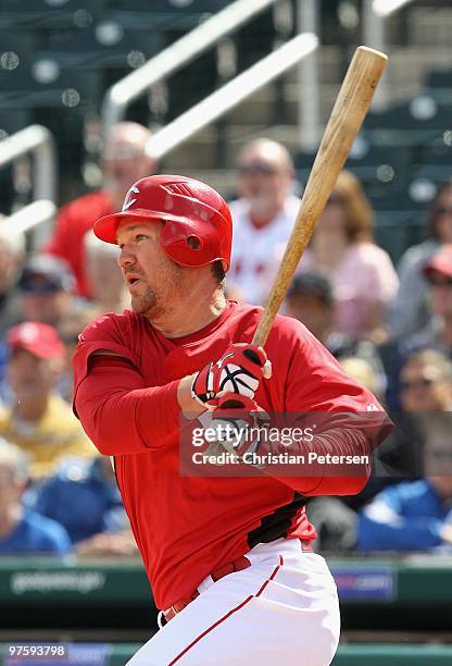 Scott Rolen of the Cincinnati Reds bats against the Kansas City Royals during the MLB spring training game at Goodyear Ballpark on March 8, 2010 in...