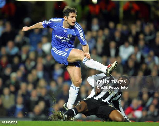 Frank Lampard of Chelsea is tackled by Charles N'Zogbia of Newcastle United during the Premiership match between Chelsea and Newcastle United at...