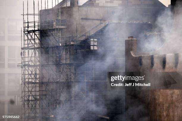 Fire fighters battle a blaze at the Mackintosh Building at the Glasgow School of Art for the second time in four years on June 16, 2018 in Glasgow,...