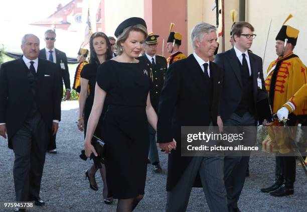 May 2018, Germany, Altshausen: King Philipp and Queen Mathilde of Belgium arrive at the funeral of Duke Friedrich of Wuerttemberg who died in a car...