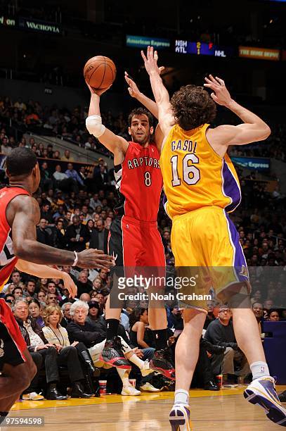 Jose Calderon of the Toronto Raptors passes against Pau Gasol of the Los Angeles Lakers at Staples Center on March 9, 2010 in Los Angeles,...
