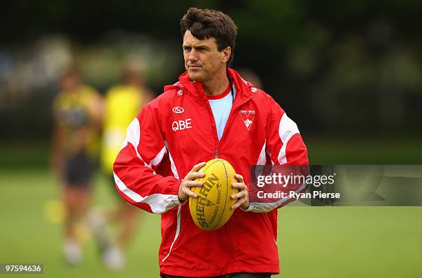 Paul Roos, coach of the Swans, looks on during a Sydney Swans AFL training session at Lakeside Oval on March 10, 2010 in Sydney, Australia.