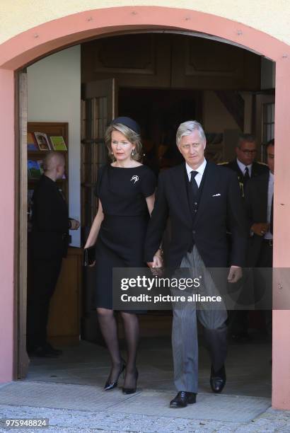 May 2018, Germany, Altshausen: King Philippe and Queen Mathilde of Belgium leave the church. Photo: Thomas Warnack/dpa