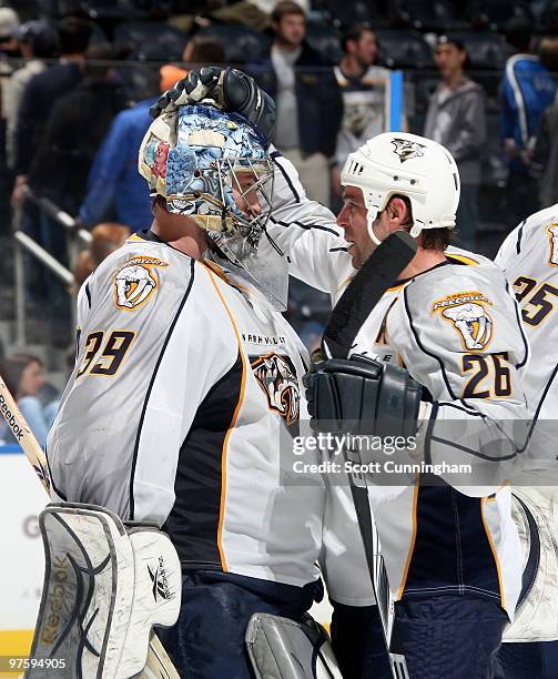 Dan Ellis of the Nashville Predators celebrates with Steve Sullivan after the game against the Atlanta Thrashers at Philips Arena on March 9, 2010 in...