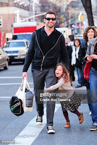 Actor Hugh Jackman walks his daughter Ava Jackman to a Soho dance studio on March 09, 2010 in New York City.