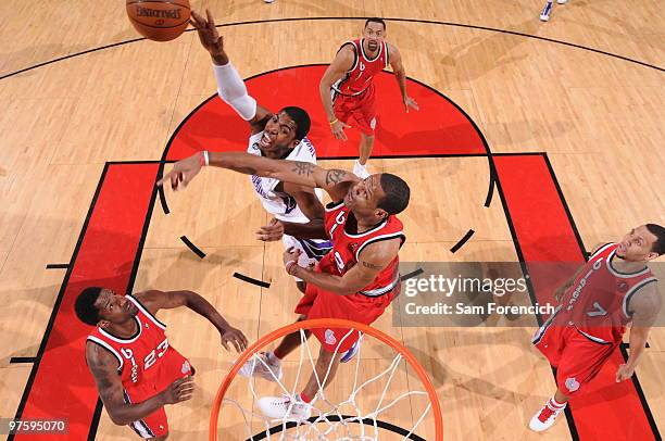 Marcus Camby of the Portland Trail Blazers blocks a shot by Jason Thompson of the Sacramento Kings during a game on March 9, 2010 at the Rose Garden...