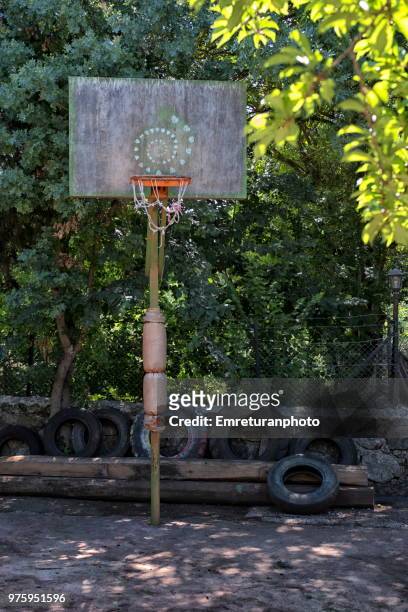 old basketball pole in camp area,kayaköy. - emreturanphoto stock pictures, royalty-free photos & images