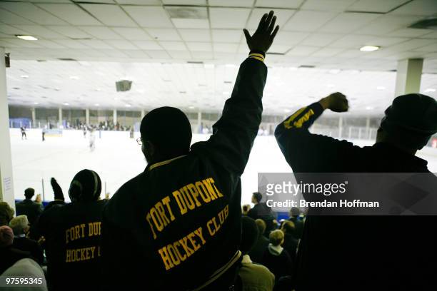 Khalil Abdul-Azim of Washington, DC , cheers after the Lawmakers scored a goal during the Congressional Hockey Challenge on March 9, 2010 in...