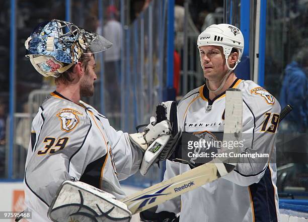 Jason Arnott of the Nashville Predators celebrates with Dan Ellis after the game against the Atlanta Thrashers at Philips Arena on March 9, 2010 in...