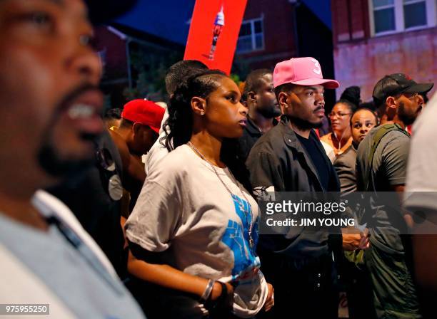 Musicians Jennifer Hudson and Chance the Rapper take part in the "End of School Year Peace March and Rally" in Chicago on June 15, 2018. - A...