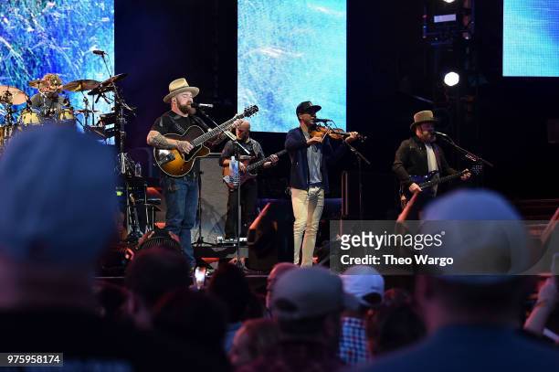 Zac Brown and Jimmy De Martini of Zac Brown Band performs on stage during the "Down The Rabbit Hole" Tour in Boston at Fenway Park on June 15, 2018...