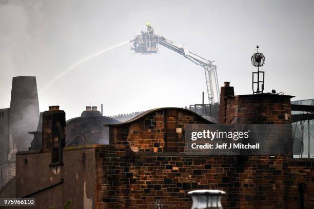 Fire fighters battle a blaze at the Glasgow School of Art for the second time in four years on June 16, Glasgow Scotland. In May 2014 it was...