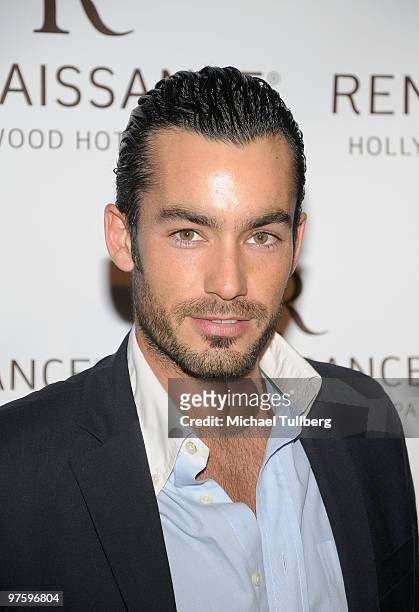 Actor Aaron Diaz arrives at a book signing and cocktail party for Emilio Estefan's book "The Rhythm Of Success" at the Renaissance Hollywood Hotel on...