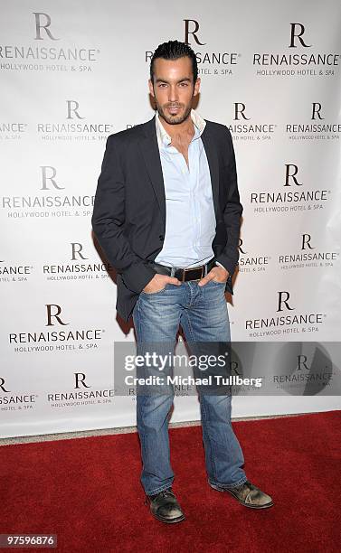 Actor Aaron Diaz arrives at a book signing and cocktail party for Emilio Estefan's book "The Rhythm Of Success" at the Renaissance Hollywood Hotel on...