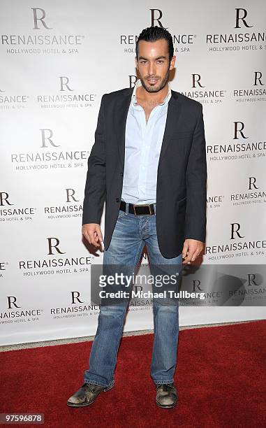 Actor Aaron Diaz arrives at a book signing and cocktail party for Emilio Estefan's book "The Rhythm Of Success" at Renaissance Hollywood Hotel on...