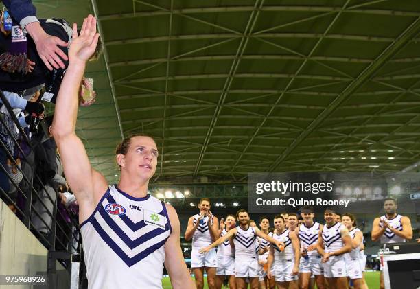 Nat Fyfe of the Dockers walks off the ground in game 150 after winning the round 13 AFL match between the Carlton Blues and the Fremantle Dockers at...