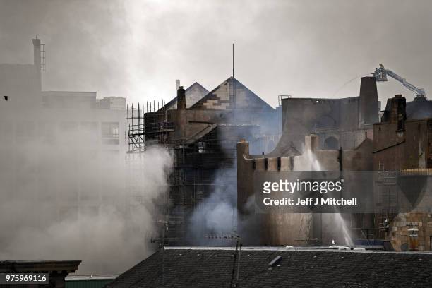Fire fighters battle a blaze at the Glasgow School of Art for the second time in four years on June 16, Glasgow Scotland. In May 2014 it was...
