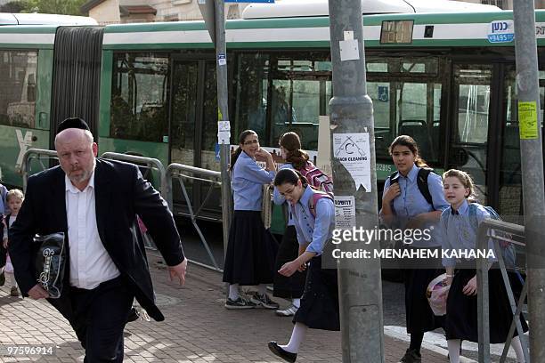 Israeli girls walk to school in Ramat Shlomo, a Jewish settlement in the mainly Arab eastern sector of Jerusalem, on March 10, 2010. Israel approved...
