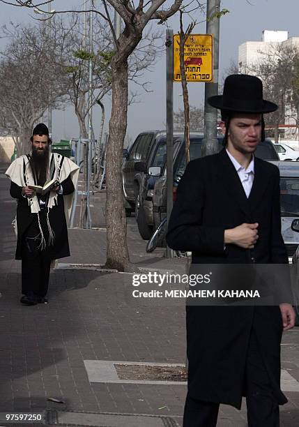 Ultra-Orthodox Jewish men walk in the streets of in Ramat Shlomo, a Jerusalem Jewish settlement, on March 10, 2010. Israel approved on March 9...