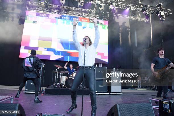 Luke Hemmings, Calum Hood, Michael Clifford, and Ashton Irwin of 5 Seconds of Summer perform at Northwell Health at Jones Beach Theater on June 15,...