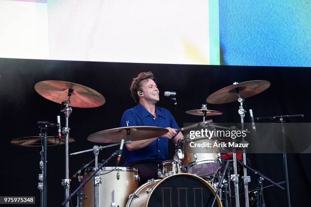 Ashton Irwin pof 5 Seconds of Summer performs at Northwell Health at Jones Beach Theater on June 15, 2018 in Wantagh, New York.