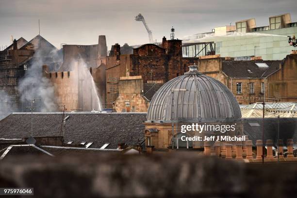 Fire fighters battle a blaze at the Glasgow School of Art for the second time in four years on June 16, Glasgow Scotland. In May 2014 it was...