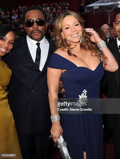 Director Lee Daniels and Singer Mariah Carey arrive at the 82nd Annual Academy Awards at the Kodak Theatre on March 7, 2010 in Hollywood, California....