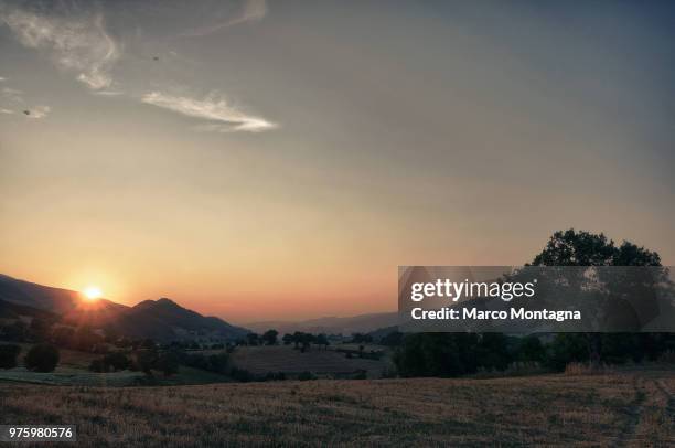 sunset of my summer - montagna stock pictures, royalty-free photos & images