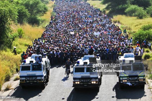 Residents from Oukasie outside Brits, protest over poor service delivery in the area on March 9, 2010 in Pretoria, South Africa. With only 93 days to...