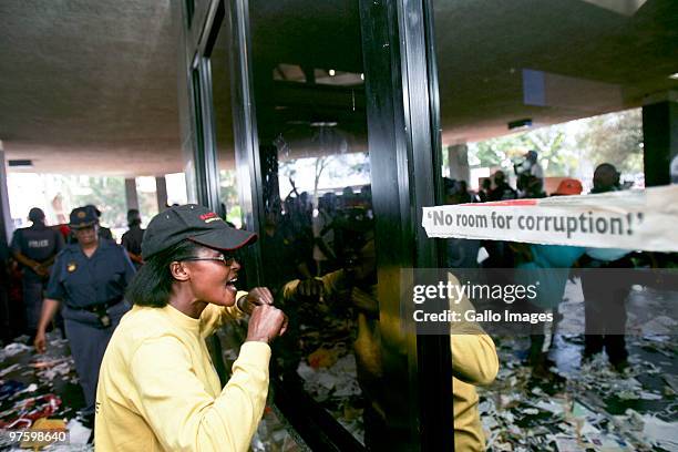 Residents from Oukasie outside Brits, protest over poor service delivery in the area on March 9, 2010 in Pretoria, South Africa. With only 93 days to...