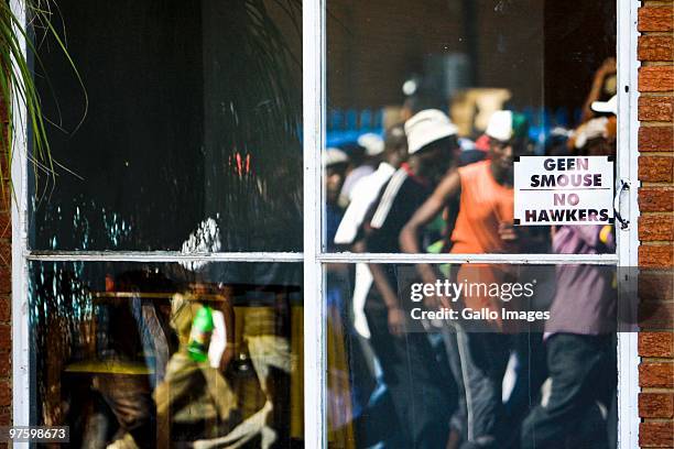 Residents from Oukasie outside Brits, protest over poor service delivery in the area on March 9, 2010 in Pretoria, South Africa. With only 93 days to...